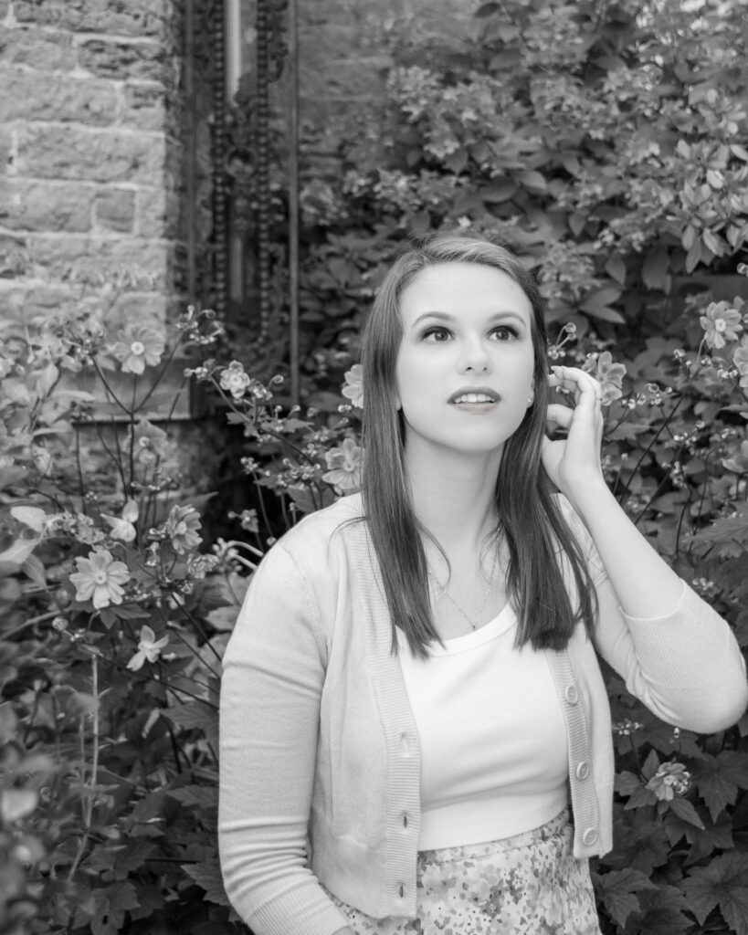 High school senior girl enjoying premium senior portrait experience during outdoor senior portrait session